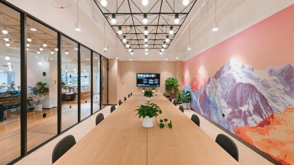 WeWork modern meeting room design featuring sleek furnishings.