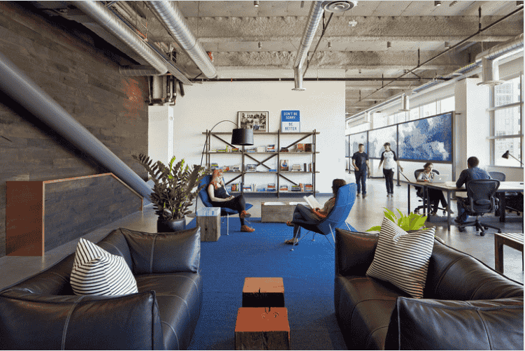 Interior view of the Dropbox office in San Francisco, featuring modern design elements and collaborative workspaces.